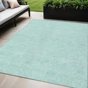 Photo of Teal Blue And Aqua Floral Washable Indoor Outdoor Area Rug