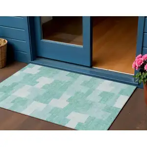 Photo of Teal Blue And Aqua Geometric Washable Indoor Outdoor Area Rug