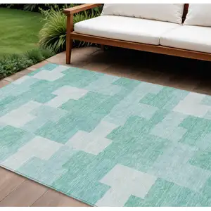 Photo of Teal Blue And Aqua Geometric Washable Indoor Outdoor Area Rug