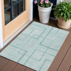 Photo of Teal Blue And Aqua Geometric Washable Indoor Outdoor Area Rug