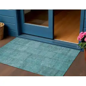 Photo of Teal Blue And Aqua Patchwork Washable Indoor Outdoor Area Rug