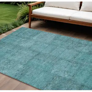 Photo of Teal Blue And Aqua Patchwork Washable Indoor Outdoor Area Rug