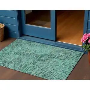 Photo of Teal Blue And Charcoal Geometric Washable Indoor Outdoor Area Rug