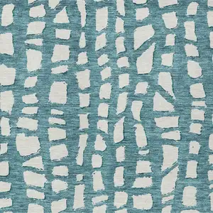 Photo of Teal Blue And Ivory Abstract Washable Indoor Outdoor Area Rug