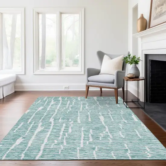 Teal Blue And Ivory Abstract Washable Indoor Outdoor Area Rug Photo 8