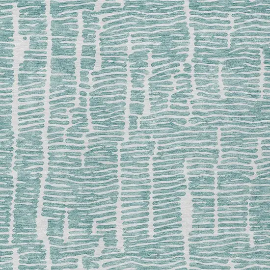 Teal Blue And Ivory Abstract Washable Indoor Outdoor Area Rug Photo 5