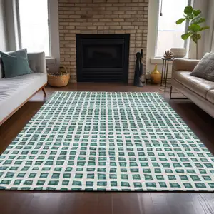 Photo of Teal Blue And Ivory Geometric Washable Indoor Outdoor Area Rug