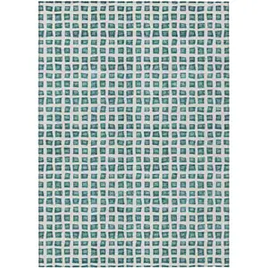 Photo of Teal Blue And Ivory Geometric Washable Indoor Outdoor Area Rug