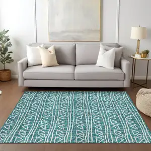 Photo of Teal Blue And Ivory Geometric Washable Indoor Outdoor Area Rug