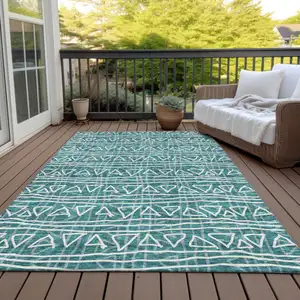 Photo of Teal Blue And Ivory Geometric Washable Indoor Outdoor Area Rug