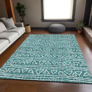 Photo of Teal Blue And Ivory Geometric Washable Indoor Outdoor Area Rug