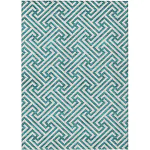 Photo of Teal Blue And Ivory Geometric Washable Indoor Outdoor Area Rug