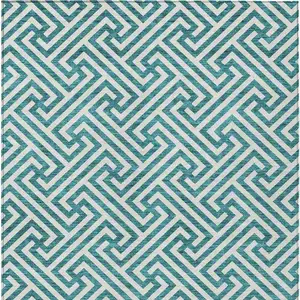 Photo of Teal Blue And Ivory Geometric Washable Indoor Outdoor Area Rug