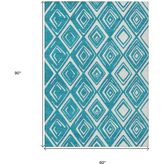 Teal Blue And Ivory Geometric Washable Indoor Outdoor Area Rug Photo 3