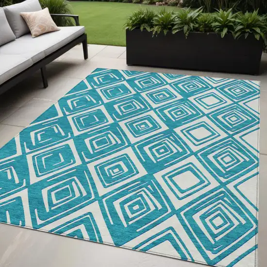 Teal Blue And Ivory Geometric Washable Indoor Outdoor Area Rug Photo 1