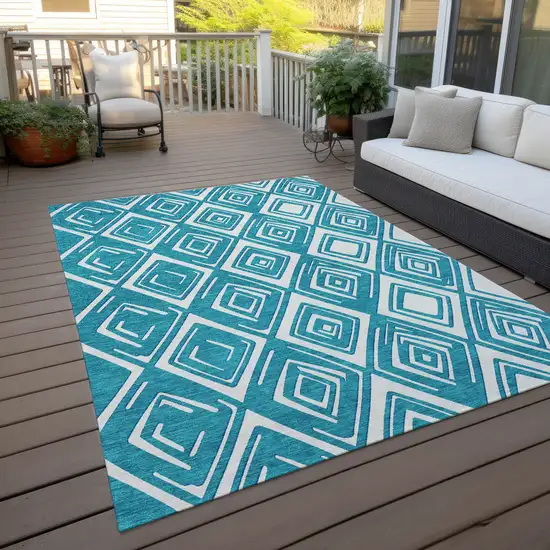 Teal Blue And Ivory Geometric Washable Indoor Outdoor Area Rug Photo 9