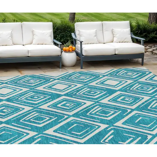 Teal Blue And Ivory Geometric Washable Indoor Outdoor Area Rug Photo 1