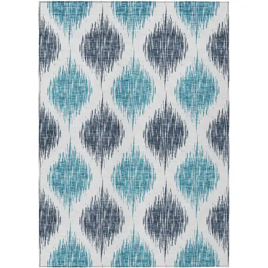 Teal Blue And Ivory Ikat Washable Indoor Outdoor Area Rug Photo 2