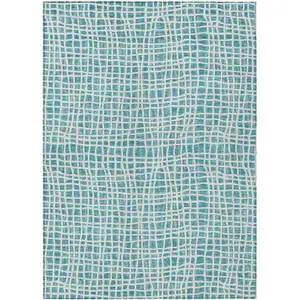 Photo of Teal Blue And Ivory Striped Washable Indoor Outdoor Area Rug