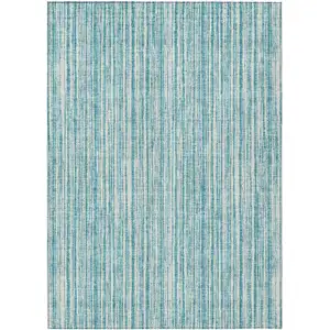 Photo of Teal Blue And Ivory Striped Washable Indoor Outdoor Area Rug