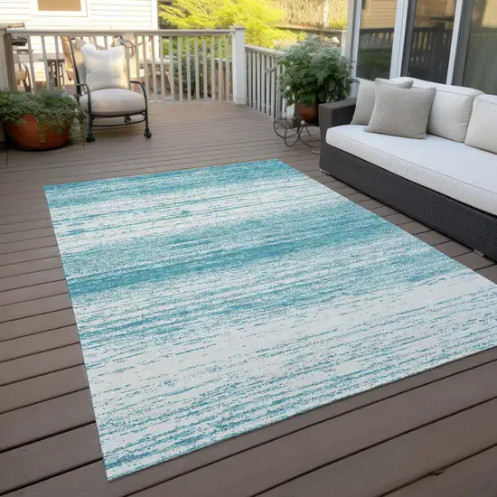 Teal Blue And Ivory Striped Washable Indoor Outdoor Area Rug Photo 8