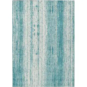 Photo of Teal Blue And Ivory Striped Washable Indoor Outdoor Area Rug