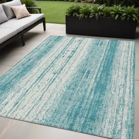 Teal Blue And Ivory Striped Washable Indoor Outdoor Area Rug Photo 1