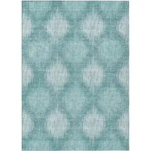 Photo of Teal Blue And Mint Green Ikat Washable Indoor Outdoor Area Rug