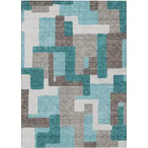 Photo of Teal Blue Aqua And Beige Abstract Washable Indoor Outdoor Area Rug