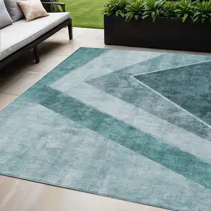 Photo of Teal Blue Aqua And Blue Geometric Washable Indoor Outdoor Area Rug