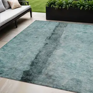 Photo of Teal Blue Aqua And Charcoal Abstract Washable Indoor Outdoor Area Rug