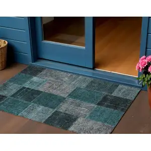 Photo of Teal Blue Aqua And Charcoal Patchwork Washable Indoor Outdoor Area Rug