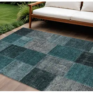 Photo of Teal Blue Aqua And Charcoal Patchwork Washable Indoor Outdoor Area Rug