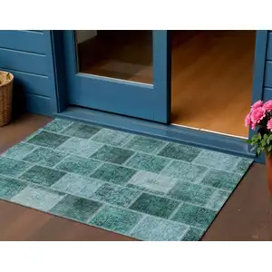 Photo of Teal Blue Aqua And Charcoal Patchwork Washable Indoor Outdoor Area Rug