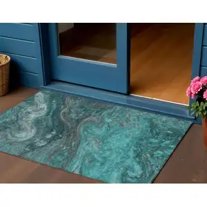 Photo of Teal Blue Aqua And Gray Abstract Washable Indoor Outdoor Area Rug