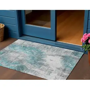 Photo of Teal Blue Aqua And Gray Abstract Washable Indoor Outdoor Area Rug