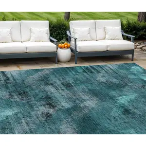 Photo of Teal Blue Aqua And Gray Abstract Washable Indoor Outdoor Area Rug