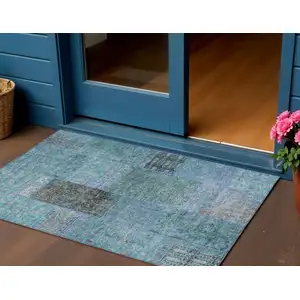 Photo of Teal Blue Aqua And Gray Patchwork Washable Indoor Outdoor Area Rug