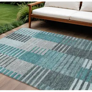 Photo of Teal Blue Aqua And Gray Striped Washable Indoor Outdoor Area Rug