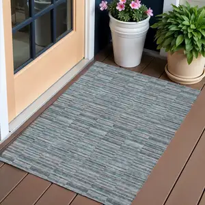 Photo of Teal Blue Aqua And Gray Striped Washable Indoor Outdoor Area Rug