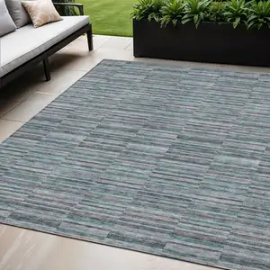 Photo of Teal Blue Aqua And Gray Striped Washable Indoor Outdoor Area Rug