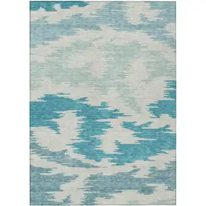 Photo of Teal Blue Aqua And Ivory Abstract Washable Indoor Outdoor Area Rug