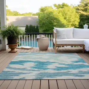 Photo of Teal Blue Aqua And Ivory Abstract Washable Indoor Outdoor Area Rug