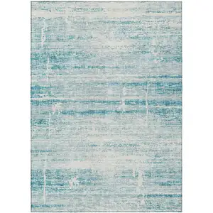 Photo of Teal Blue Aqua And Ivory Abstract Washable Indoor Outdoor Area Rug