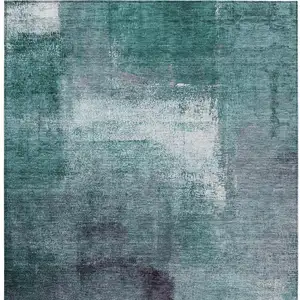 Photo of Teal Blue Aqua And Ivory Abstract Washable Indoor Outdoor Area Rug