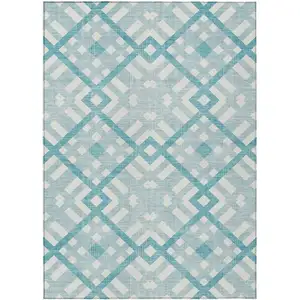 Photo of Teal Blue Aqua And Ivory Geometric Washable Indoor Outdoor Area Rug