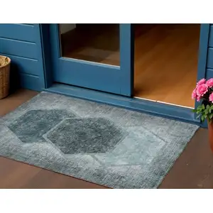 Photo of Teal Blue Aqua And Ivory Geometric Washable Indoor Outdoor Area Rug