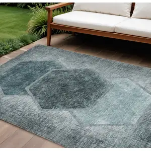 Photo of Teal Blue Aqua And Ivory Geometric Washable Indoor Outdoor Area Rug