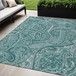 Photo of Teal Blue Aqua And Ivory Paisley Washable Indoor Outdoor Area Rug