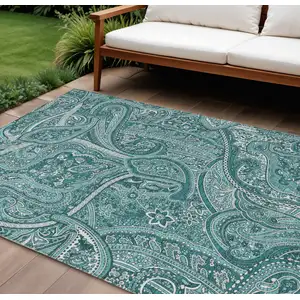 Photo of Teal Blue Aqua And Ivory Paisley Washable Indoor Outdoor Area Rug